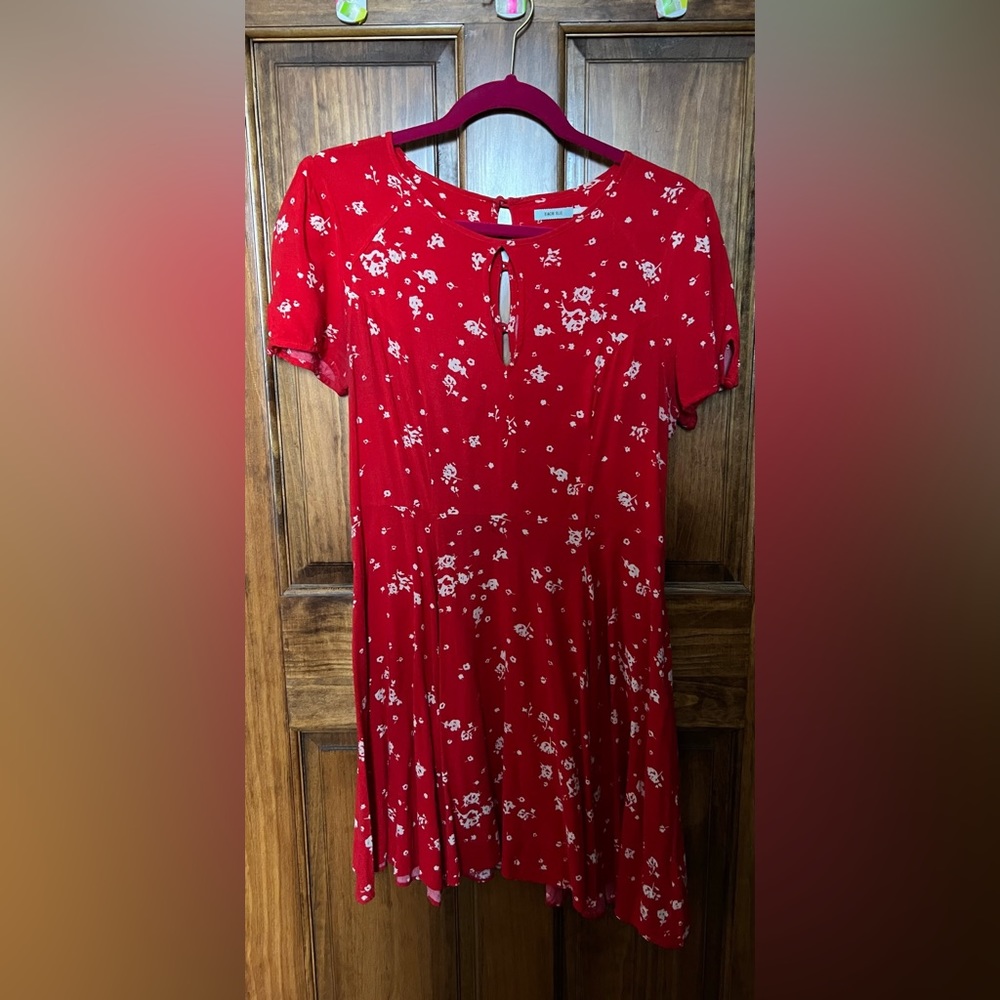 Red Dress with Flower Accents